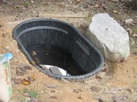 Tank in hole photo